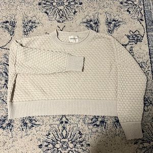 Cropped white knit sweater